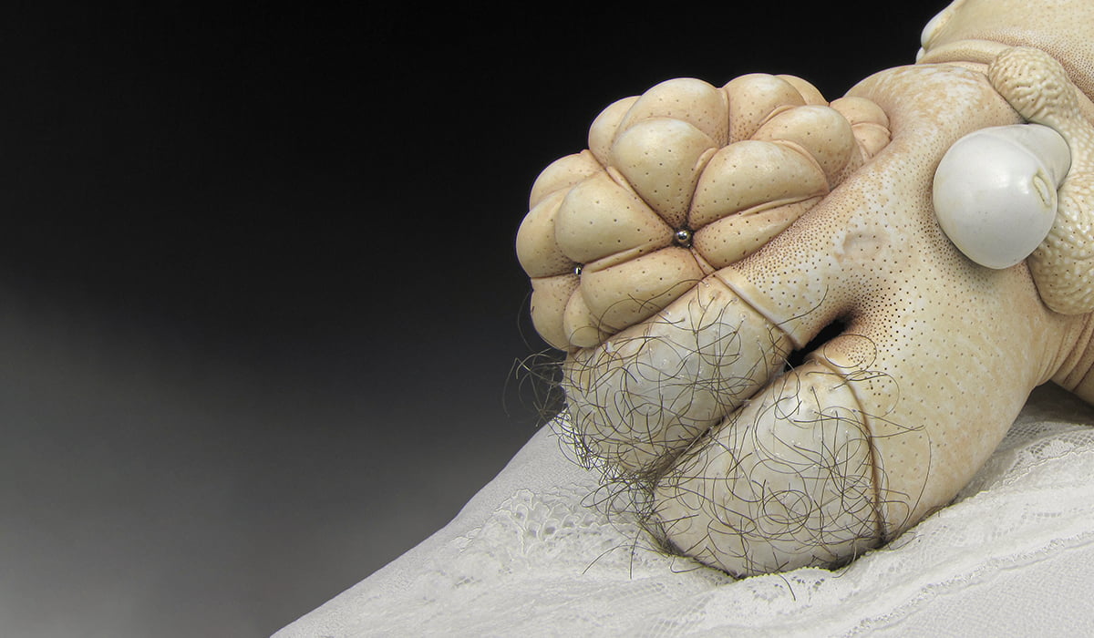 Jason Briggs "Angel" (detail 2). Porcelain, hair, and mixed media sculptural ceramic art.