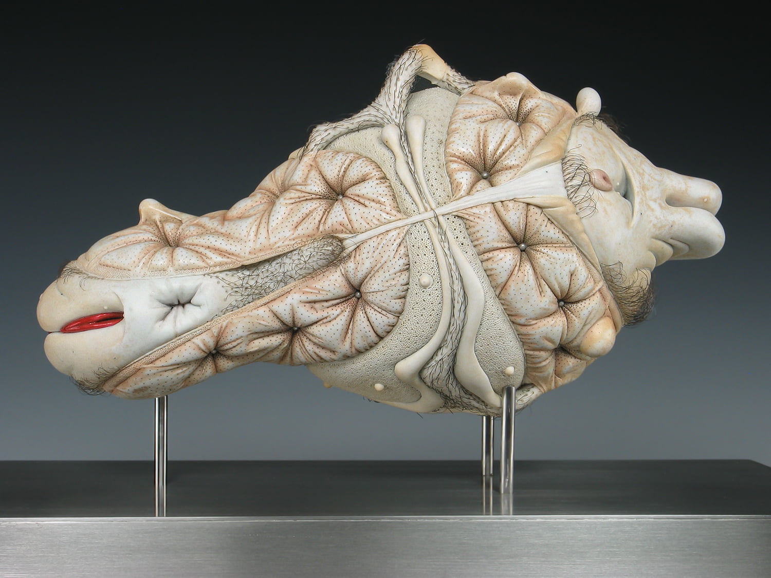 Jason Briggs "Flirt" (detail 3). Porcelian, hair, and mixed media. Sculptural ceramic art object.