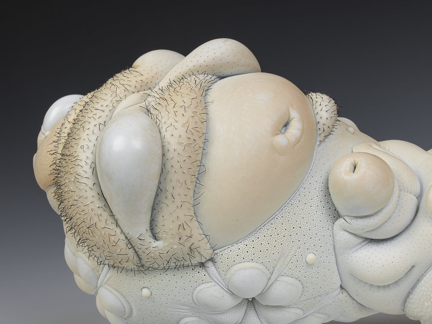 Jason Briggs "Olympia" (detail 4). porcelain, hair, and mixed media sculpture ceramics.