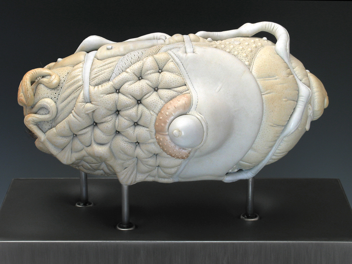 Jason Briggs "Crush". Porcelian, hair, and mixed media. Sculptural ceramic art object.