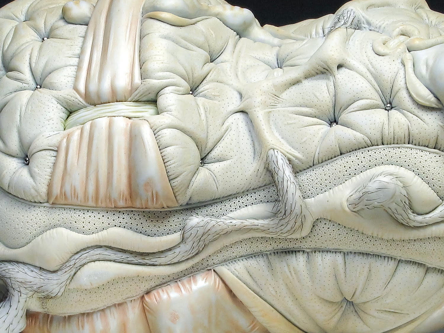 Jason Briggs "Seed" (detail). porcelain, hair, and mixed media sculptural ceramic art.