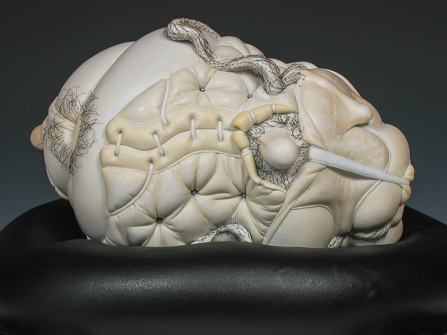 Jason Briggs "Crush". Porcelian, hair, and mixed media. Sculptural ceramic art object.